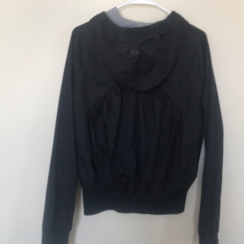 Reversible waterproof jacket - Picture 3 of 6